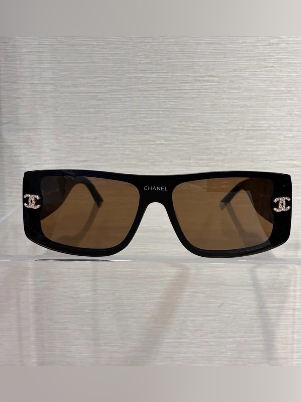 CHANEL Black Shield Sunglasses with Brown Lenses and CC Logo